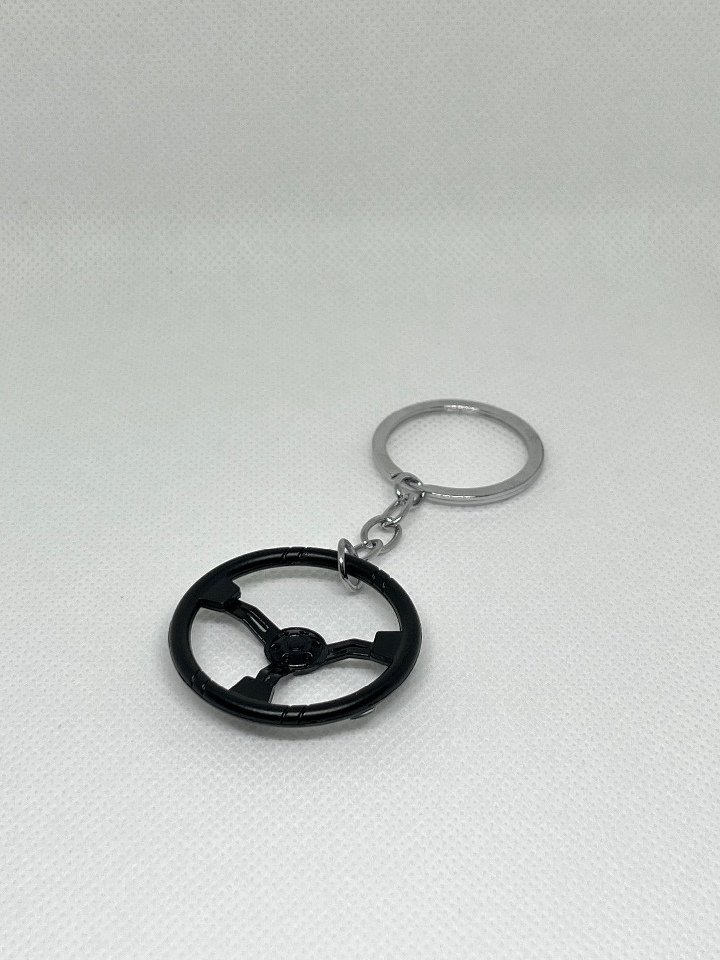 Schlüsselanhänger Auto – Lenkrad